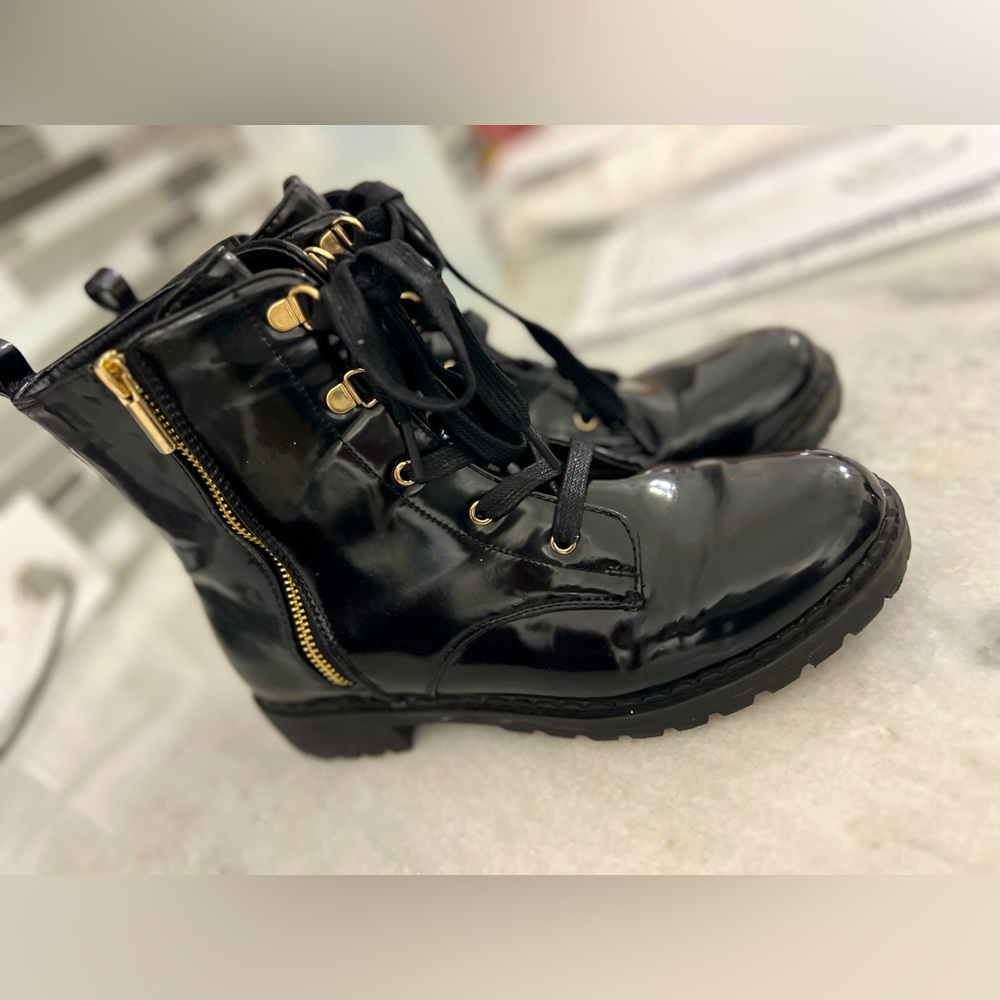 Size 9 black patent leather, lace up/combat style boots.